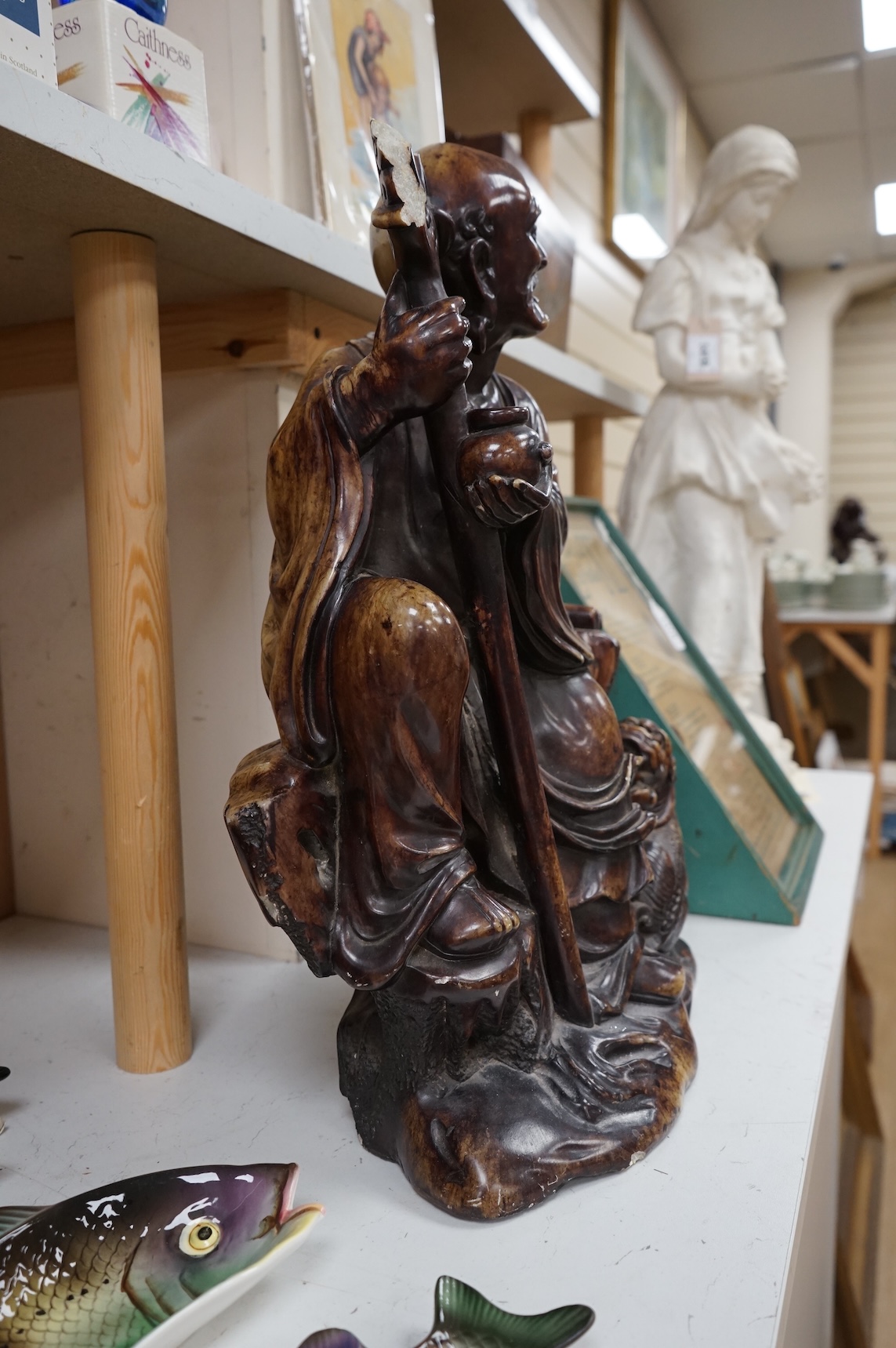 A large Chinese soapstone figure of a Luohan, 49cm